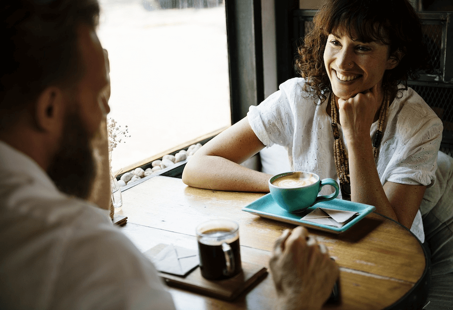 Keep business and personal expenses separate: A photo of two people sitting together at a table